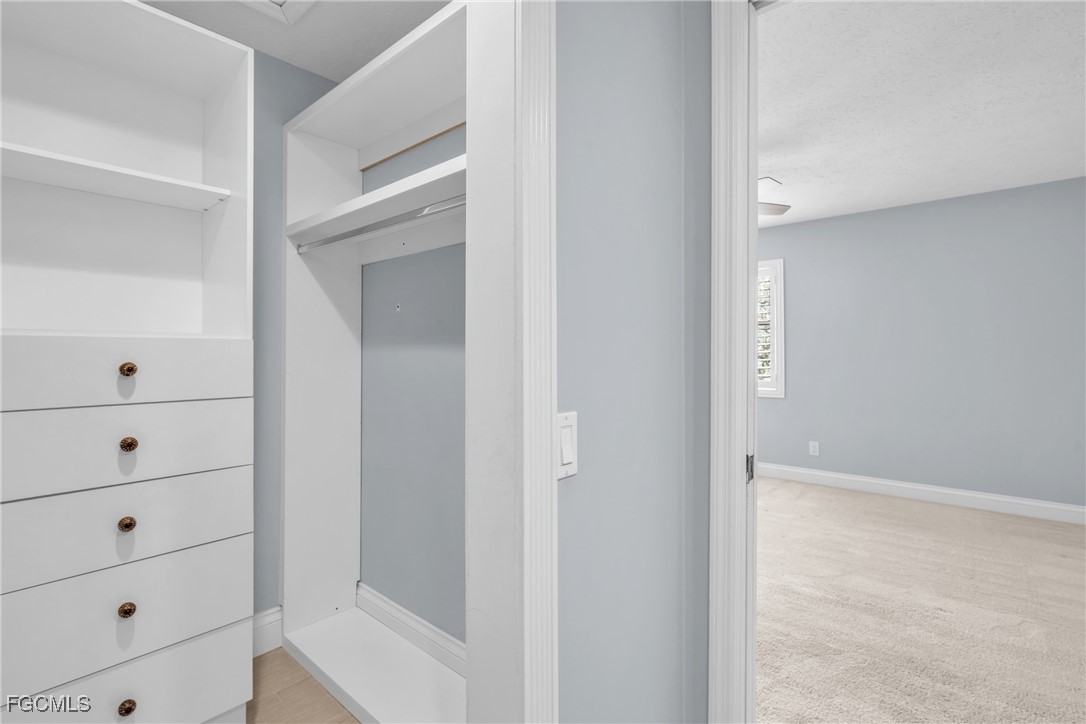 1526 Trafalgar Lane, Unit B Naples, FL 34116 - Photo 13 of 33 a view of a closet
