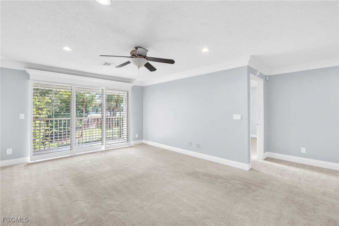 1526 Trafalgar Lane, Unit B Naples, FL 34116 - Photo 23 of 33 a view of an empty room with a window