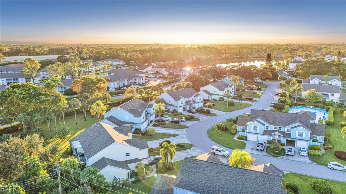 1526 Trafalgar Lane, Unit B Naples, FL 34116 - Photo 33 of 33 an aerial view of residential houses with outdoor space and ocean view