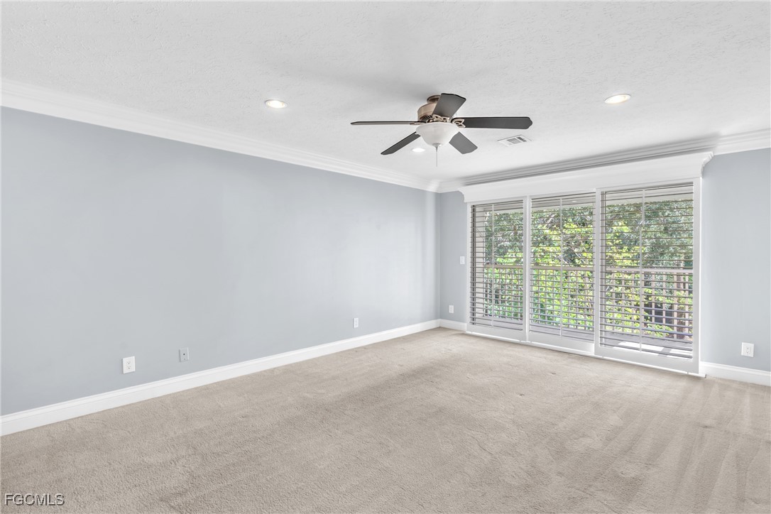 1526 Trafalgar Lane, Unit B Naples, FL 34116 - Photo 5 of 33 a view of an empty room with a window