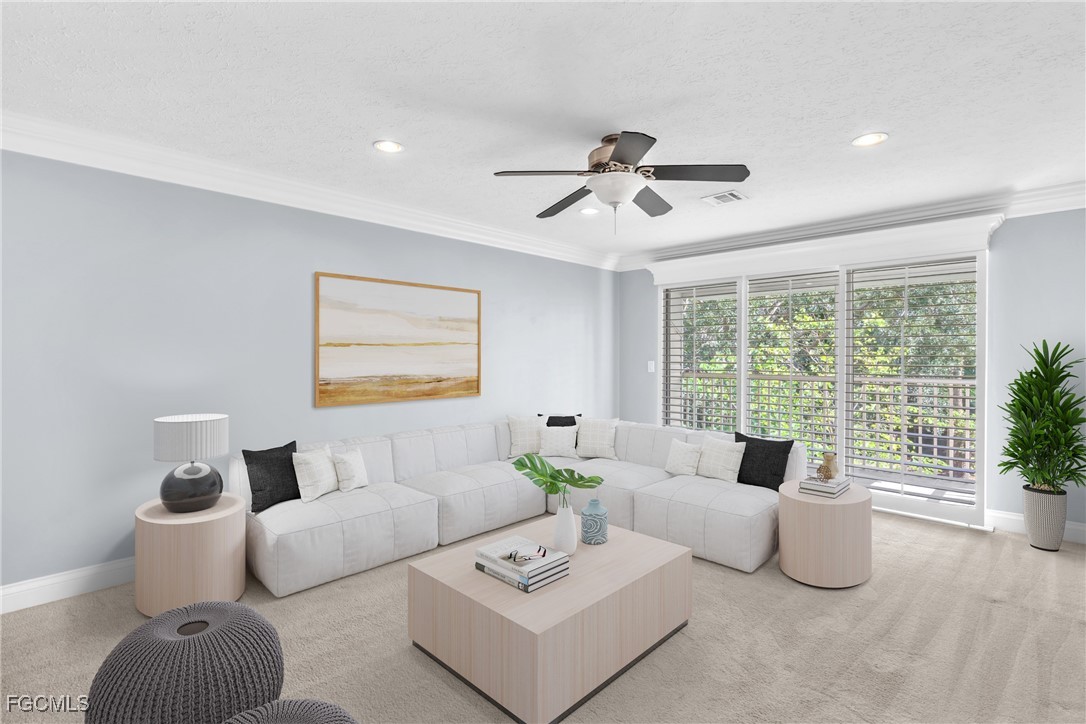 1526 Trafalgar Lane, Unit B Naples, FL 34116 - Photo 6 of 33 a living room with furniture and a large window