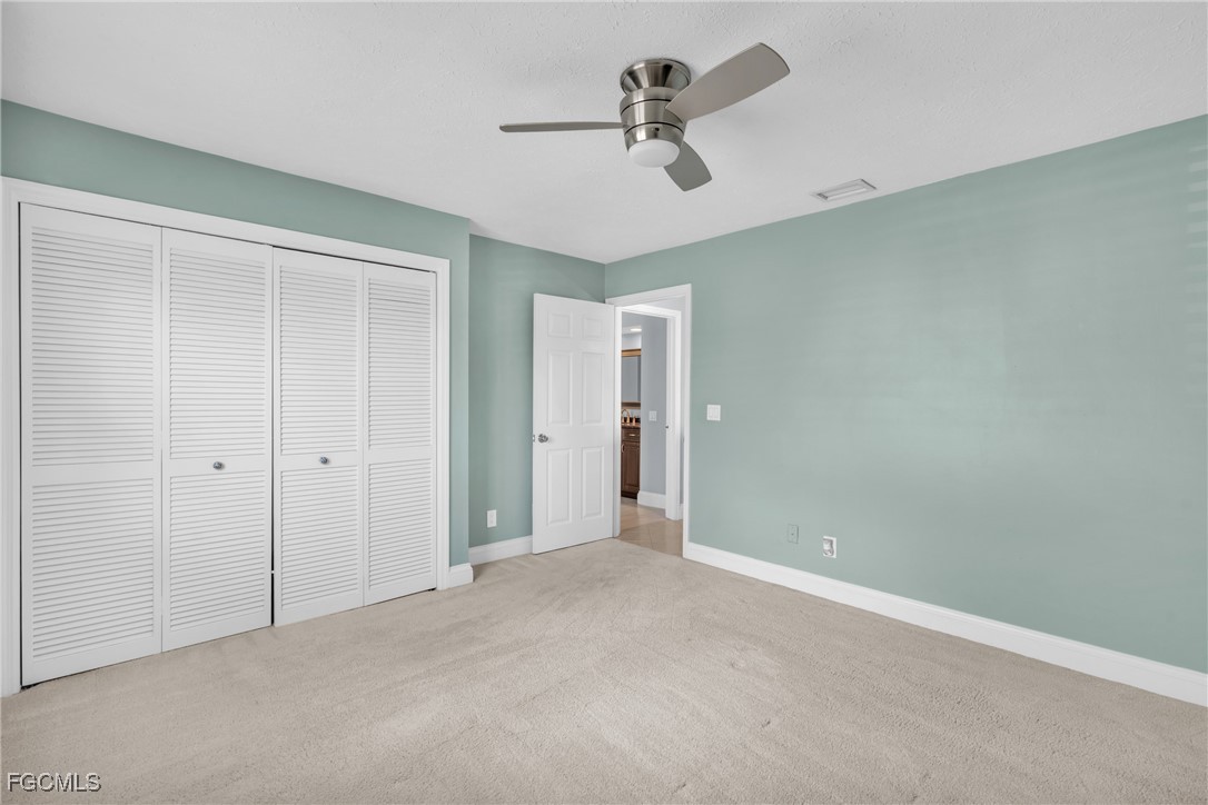 1526 Trafalgar Lane, Unit B Naples, FL 34116 - Photo 10 of 33 a view of room with ceiling fan