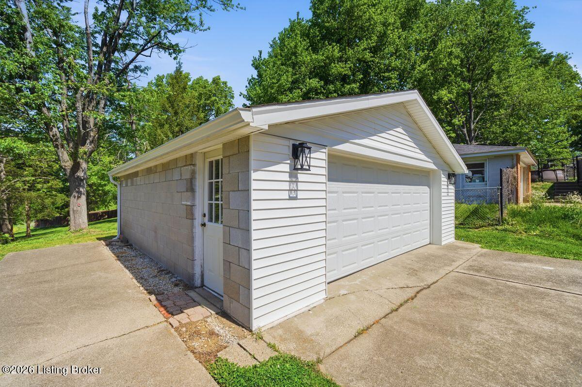 5503 Beth Road Louisville, KY 40219 - Photo 31 of 39 2 car detached garage with pedestrian access door