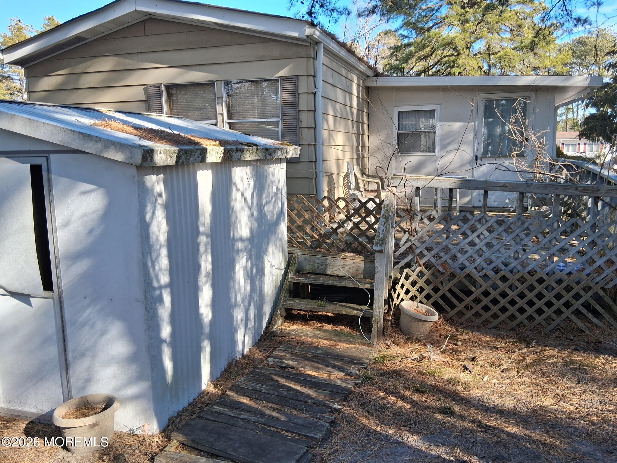 10 Seagull Court Whiting, NJ 08759 - Photo 4 of 11 a view of a house with a porch