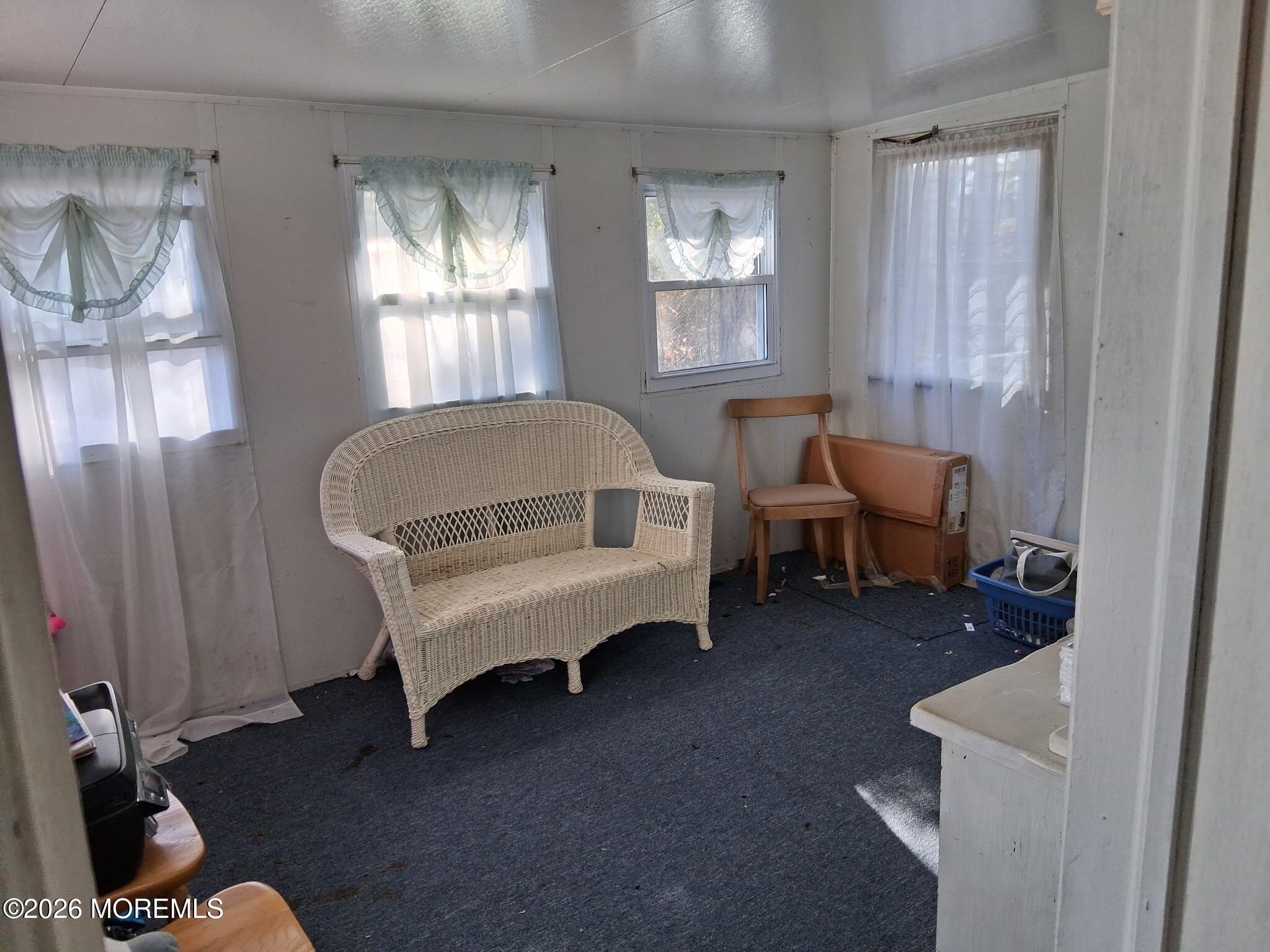 10 Seagull Court Whiting, NJ 08759 - Photo 5 of 11 a living room with furniture a window and gym equipment