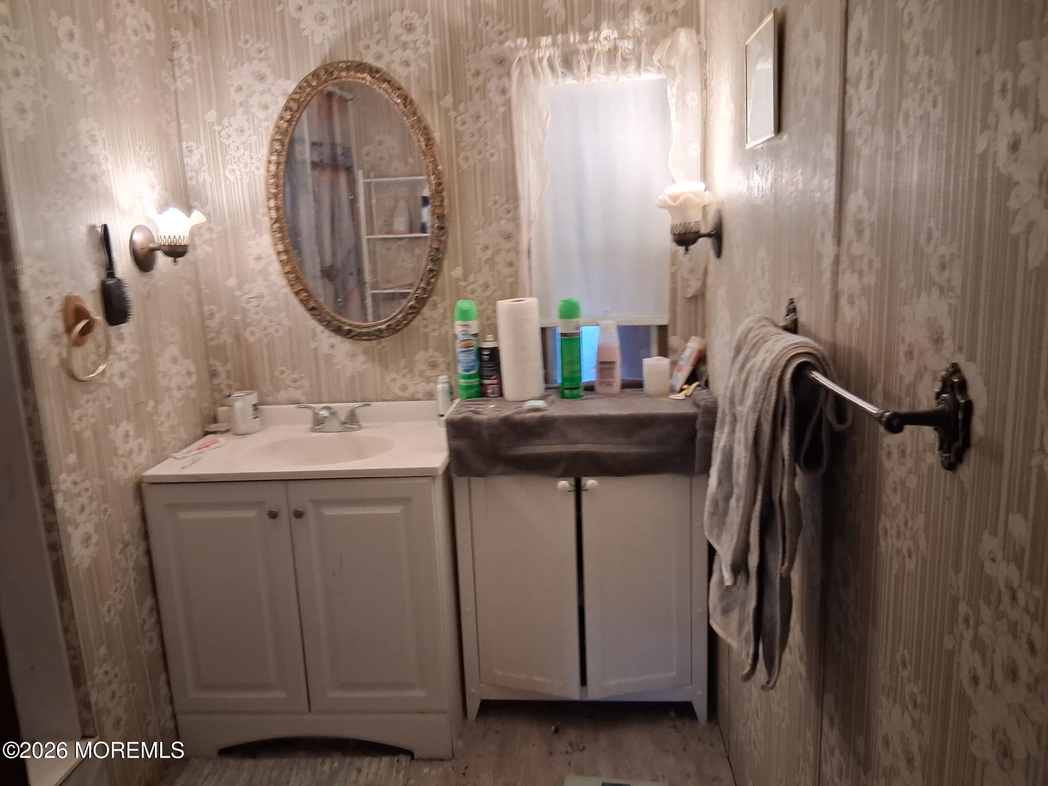 10 Seagull Court Whiting, NJ 08759 - Photo 6 of 11 a bathroom with a sink and a mirror