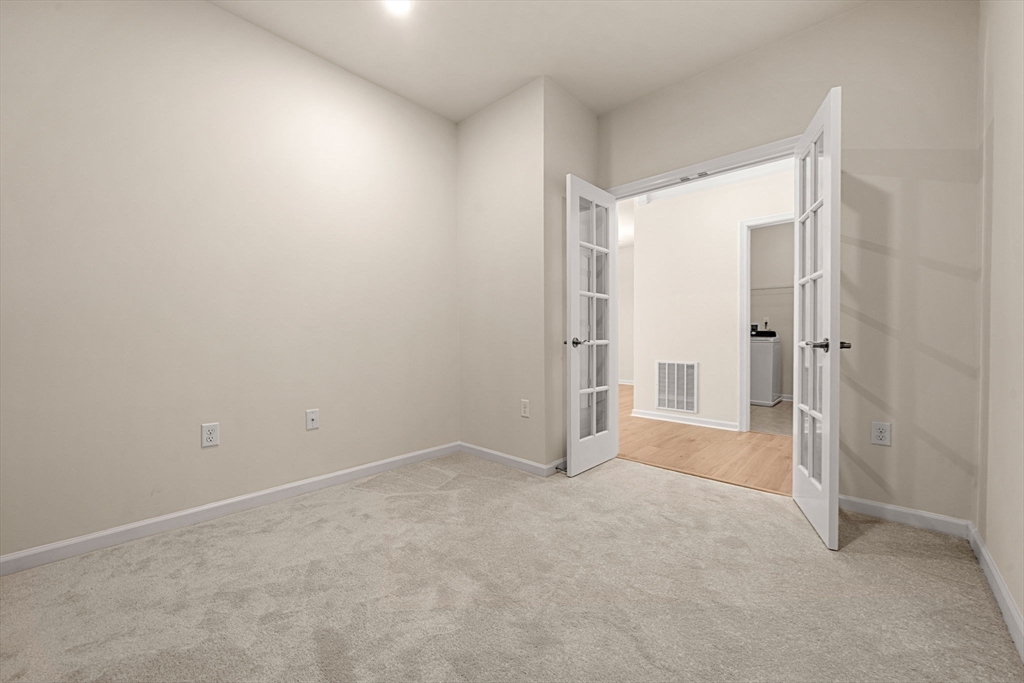 2 Stratton Drive, Unit 102 Woburn, MA 01801 - Photo 11 of 32 a view of an empty room