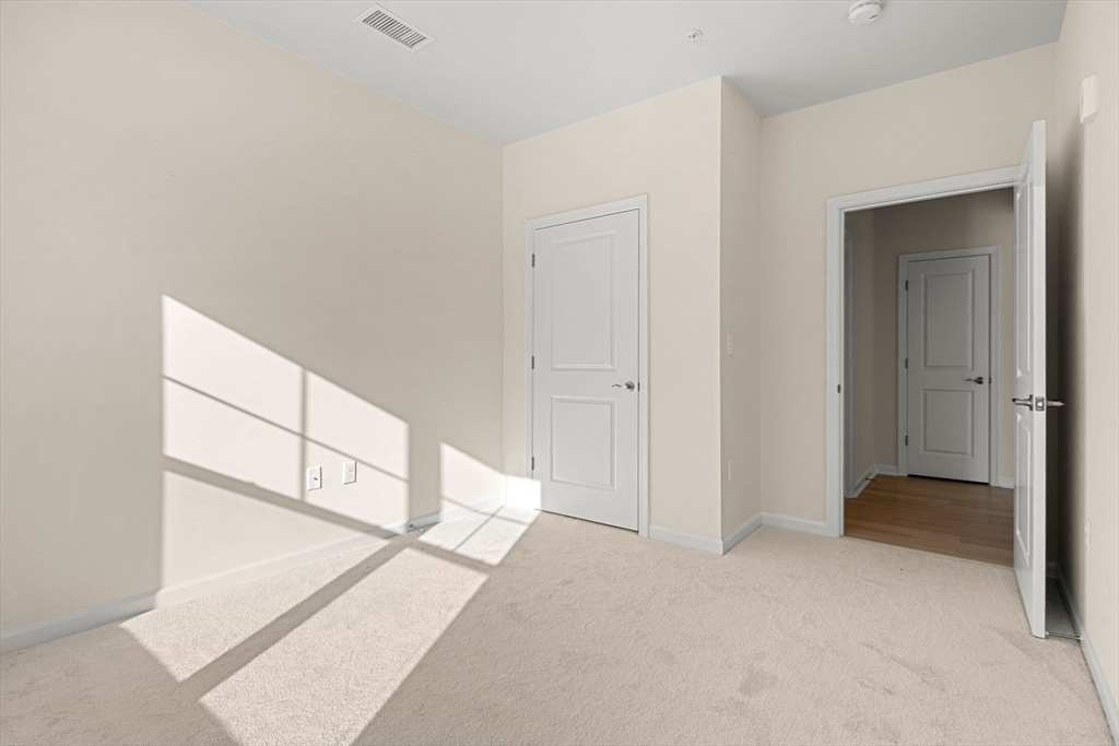 2 Stratton Drive, Unit 102 Woburn, MA 01801 - Photo 24 of 32 a view of a room with drop ceiling