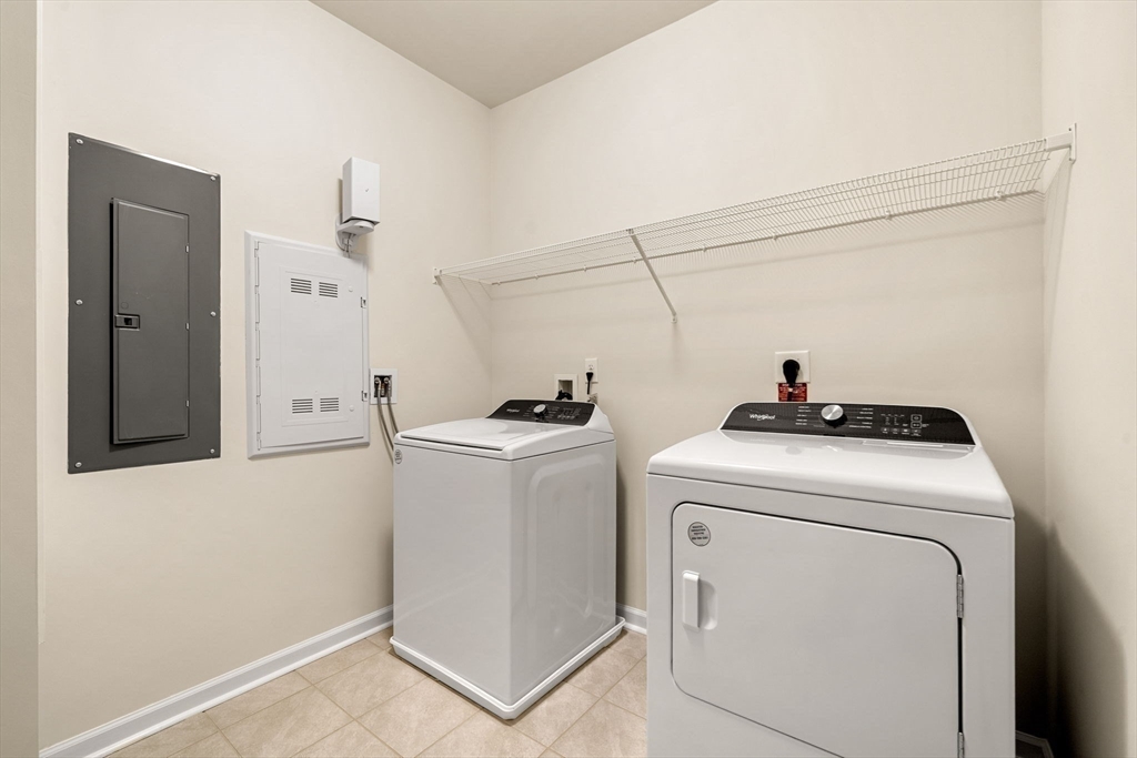 2 Stratton Drive, Unit 102 Woburn, MA 01801 - Photo 26 of 32 a utility room with dryer and washer