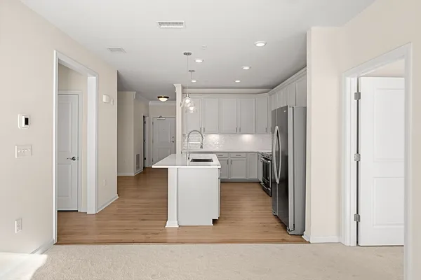a view of kitchen with wooden floor