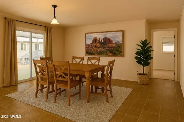a view of a dining room with furniture