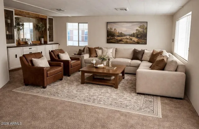 a dining room with furniture and window