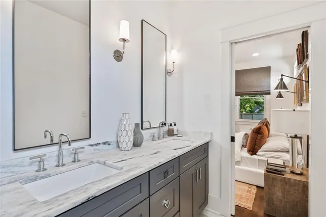 a view of a patio with couches table and chairs and potted plants