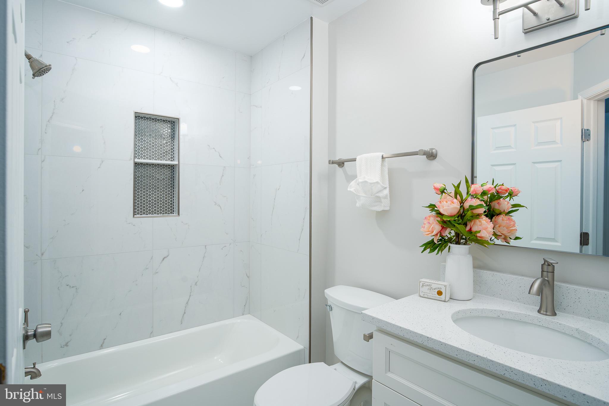 114 Gentlebrook Road Owings Mills, MD 21117 - Photo 15 of 20 Modern elegance in a serene bathroom.