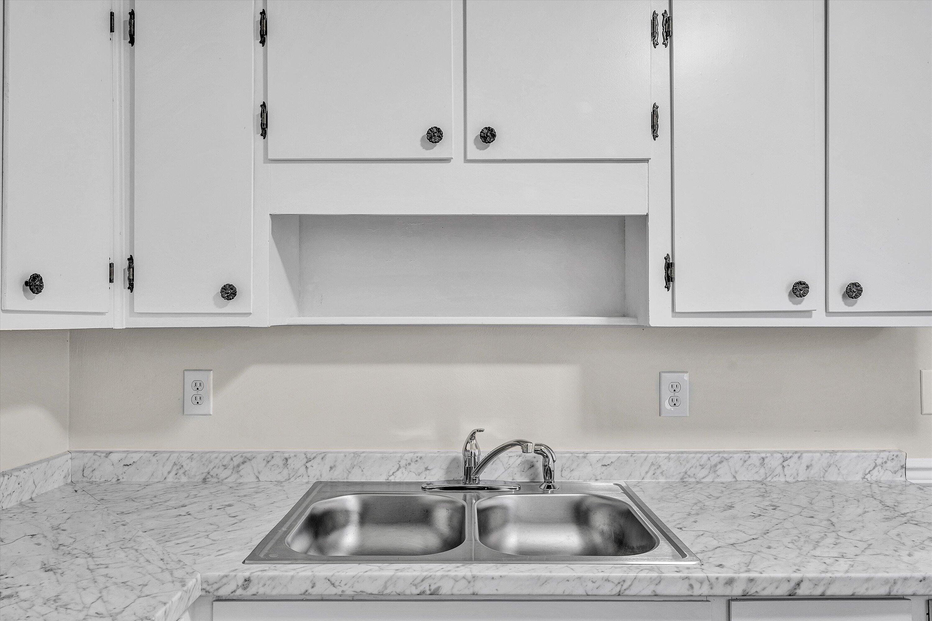 4524 Ohio Street Northeast, Unit 4528 Roanoke, VA 24019 - Photo 12 of 28 a kitchen with a sink and cabinets