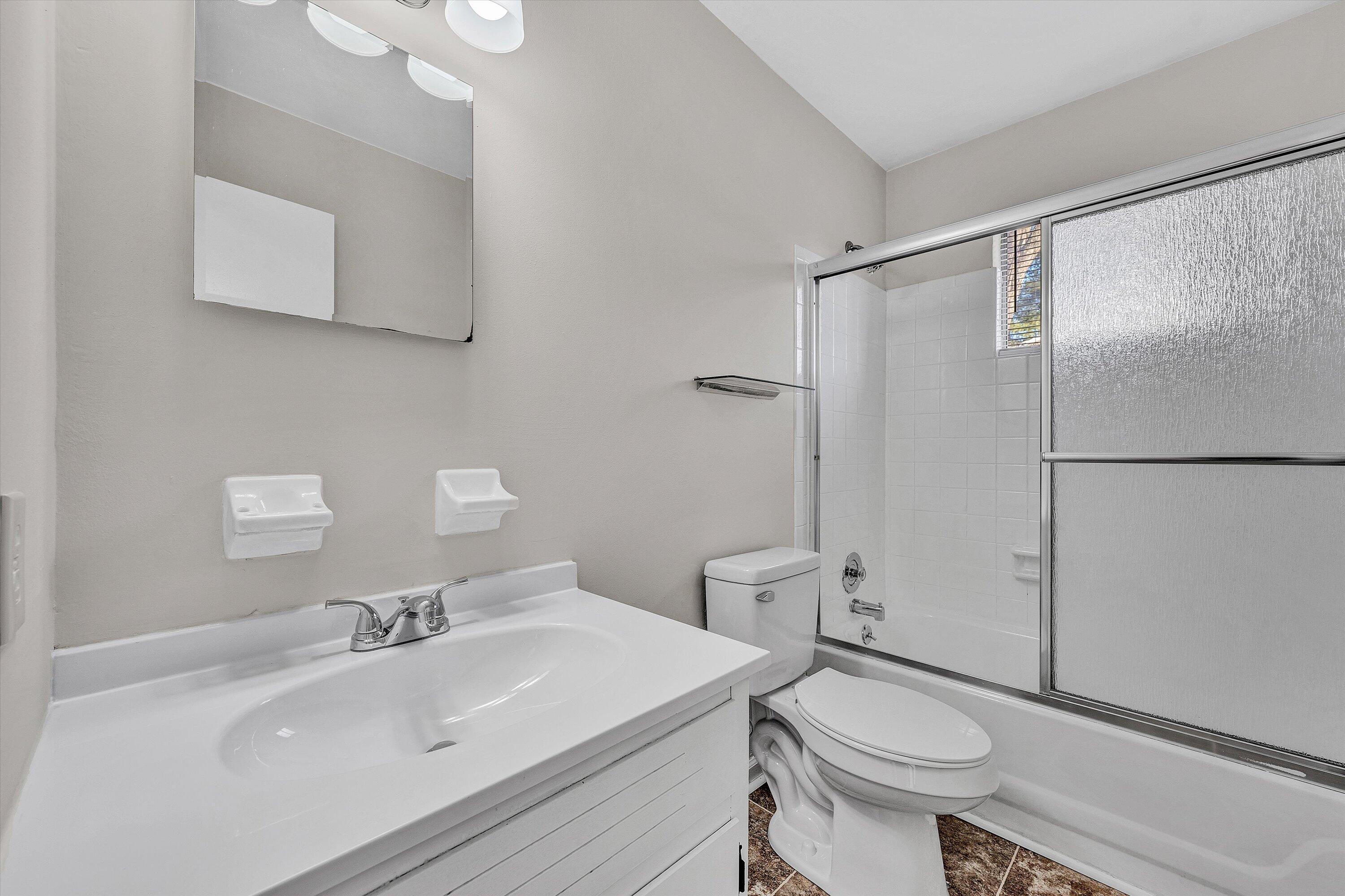 4524 Ohio Street Northeast, Unit 4528 Roanoke, VA 24019 - Photo 16 of 28 a bathroom with a sink toilet and shower
