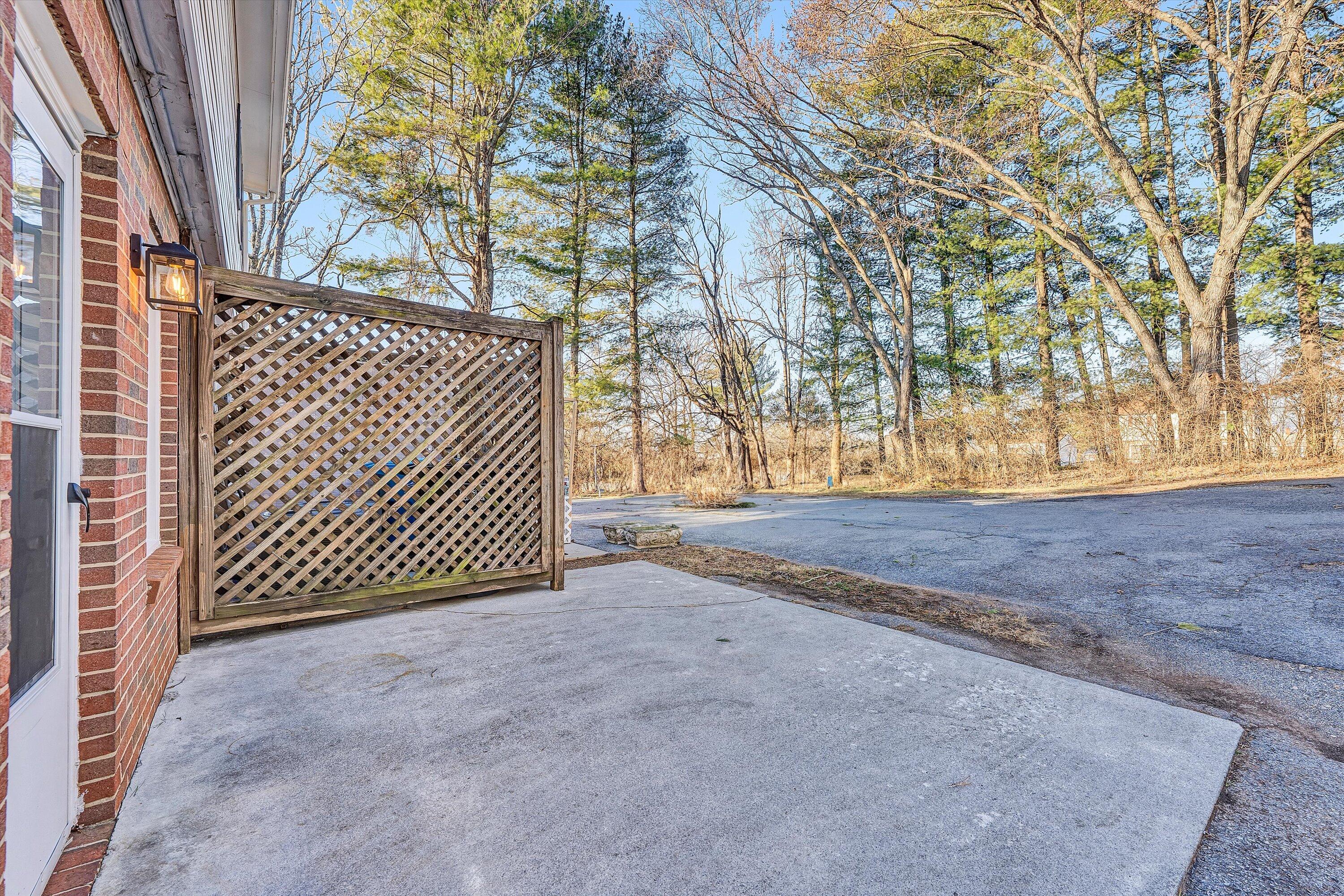 4524 Ohio Street Northeast, Unit 4528 Roanoke, VA 24019 - Photo 22 of 28 a view of a backyard with wooden fence