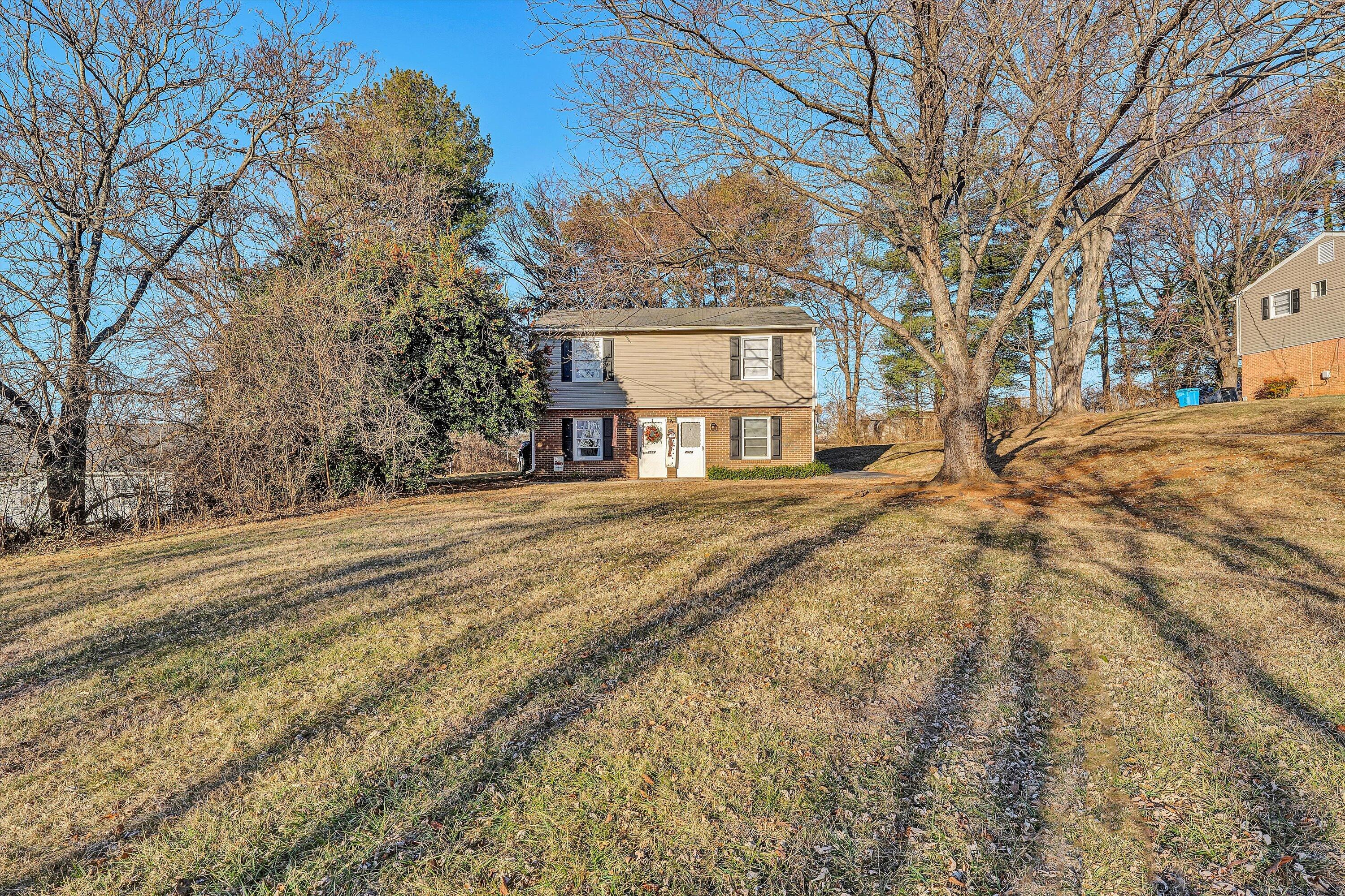 4524 Ohio Street Northeast, Unit 4528 Roanoke, VA 24019 - Photo 24 of 28 a view of a yard with a snow on the road