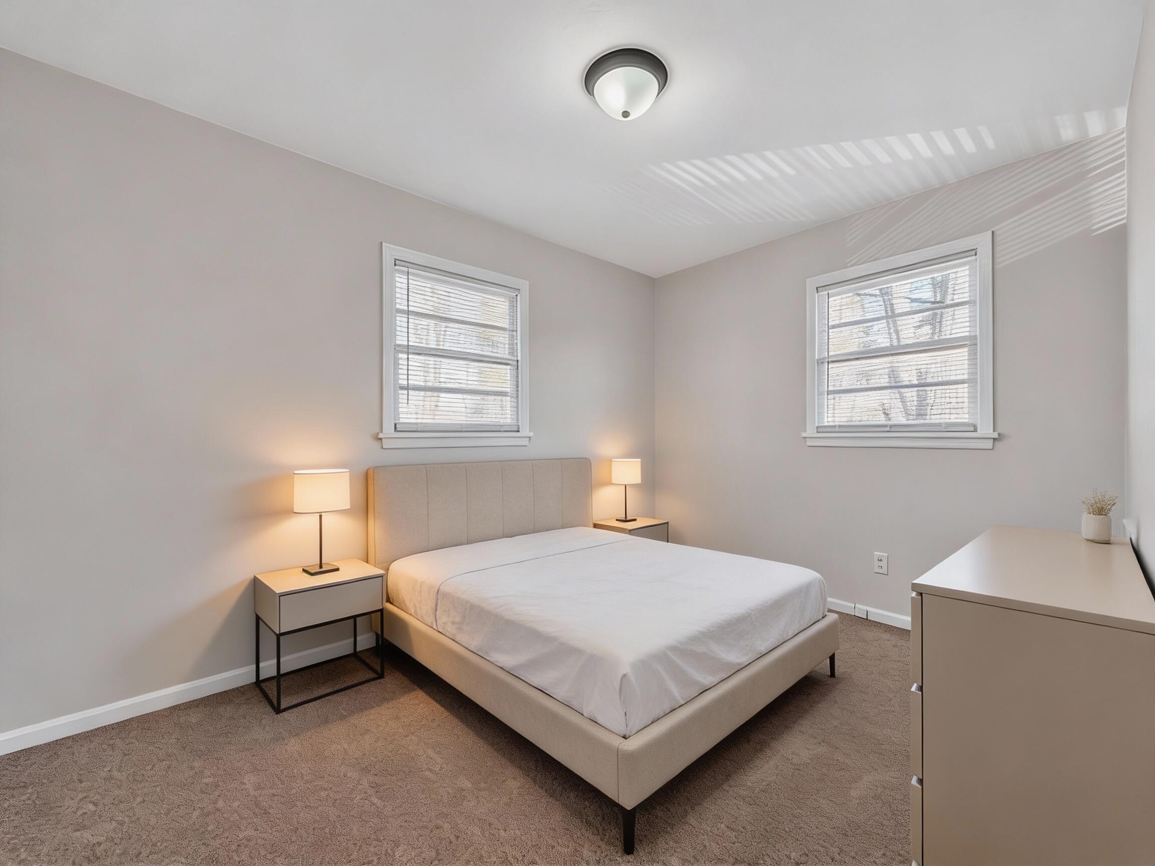 4524 Ohio Street Northeast, Unit 4528 Roanoke, VA 24019 - Photo 25 of 28 a bedroom with a bed and a window