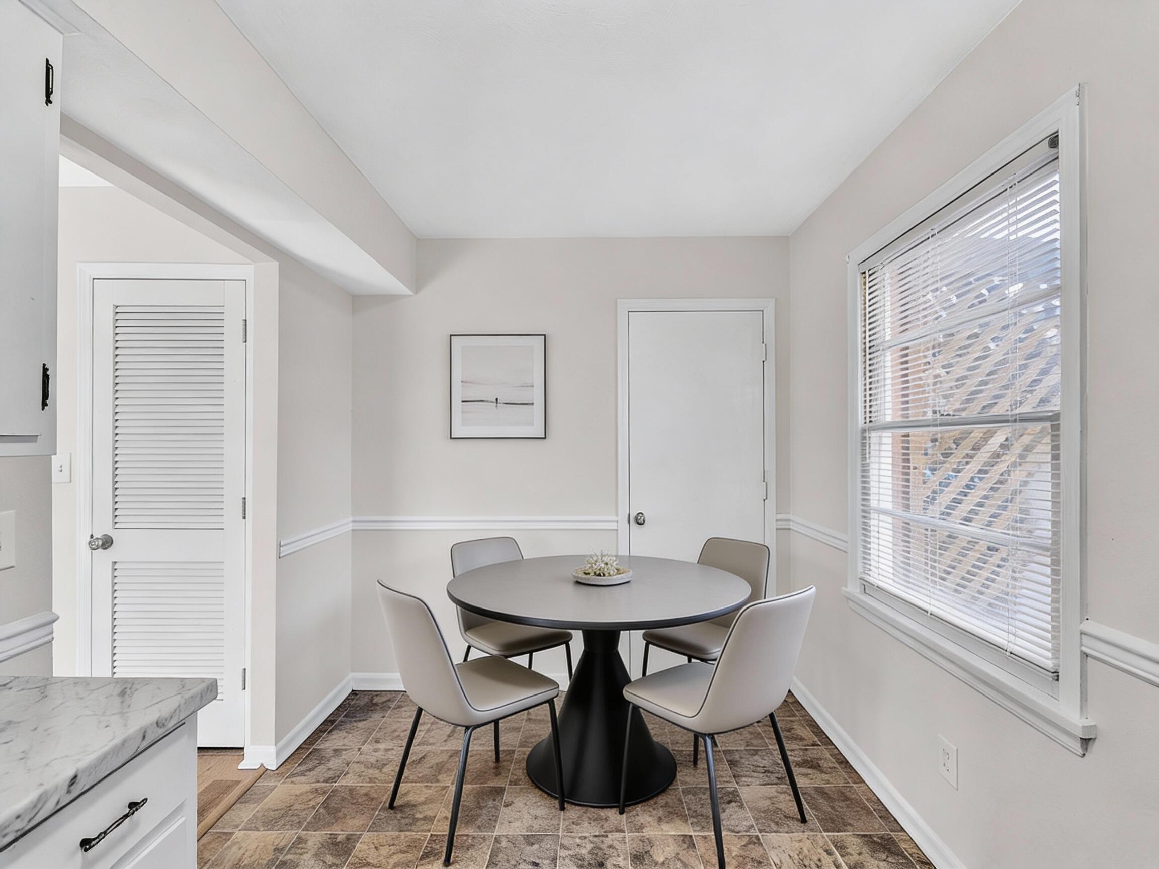 4524 Ohio Street Northeast, Unit 4528 Roanoke, VA 24019 - Photo 26 of 28 a view of a dining room with furniture and a window