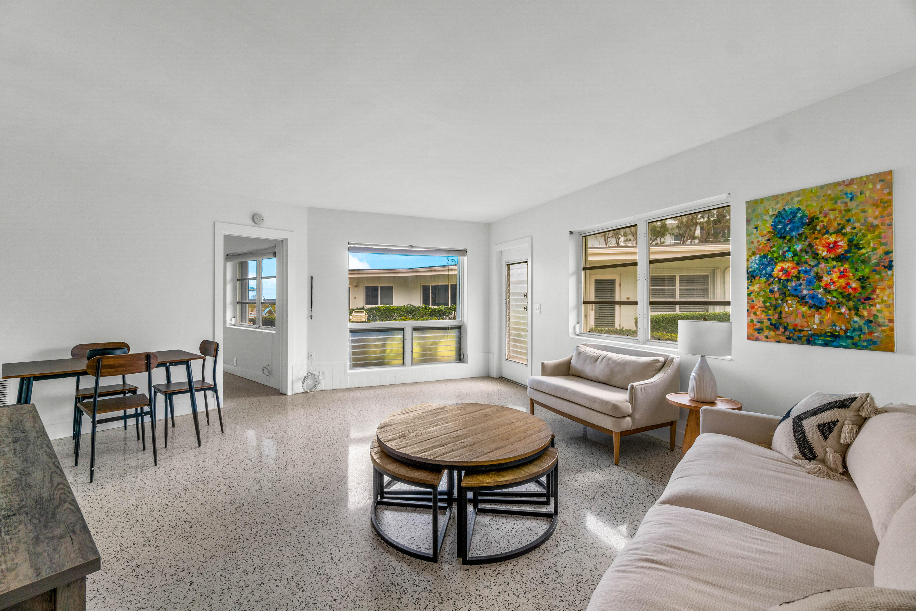 1191 South Ocean Boulevard, Unit 6 Delray Beach, FL 33483 - Photo 5 of 19 a living room with furniture and a window