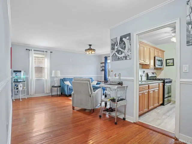 a bed room with a bed and a chair