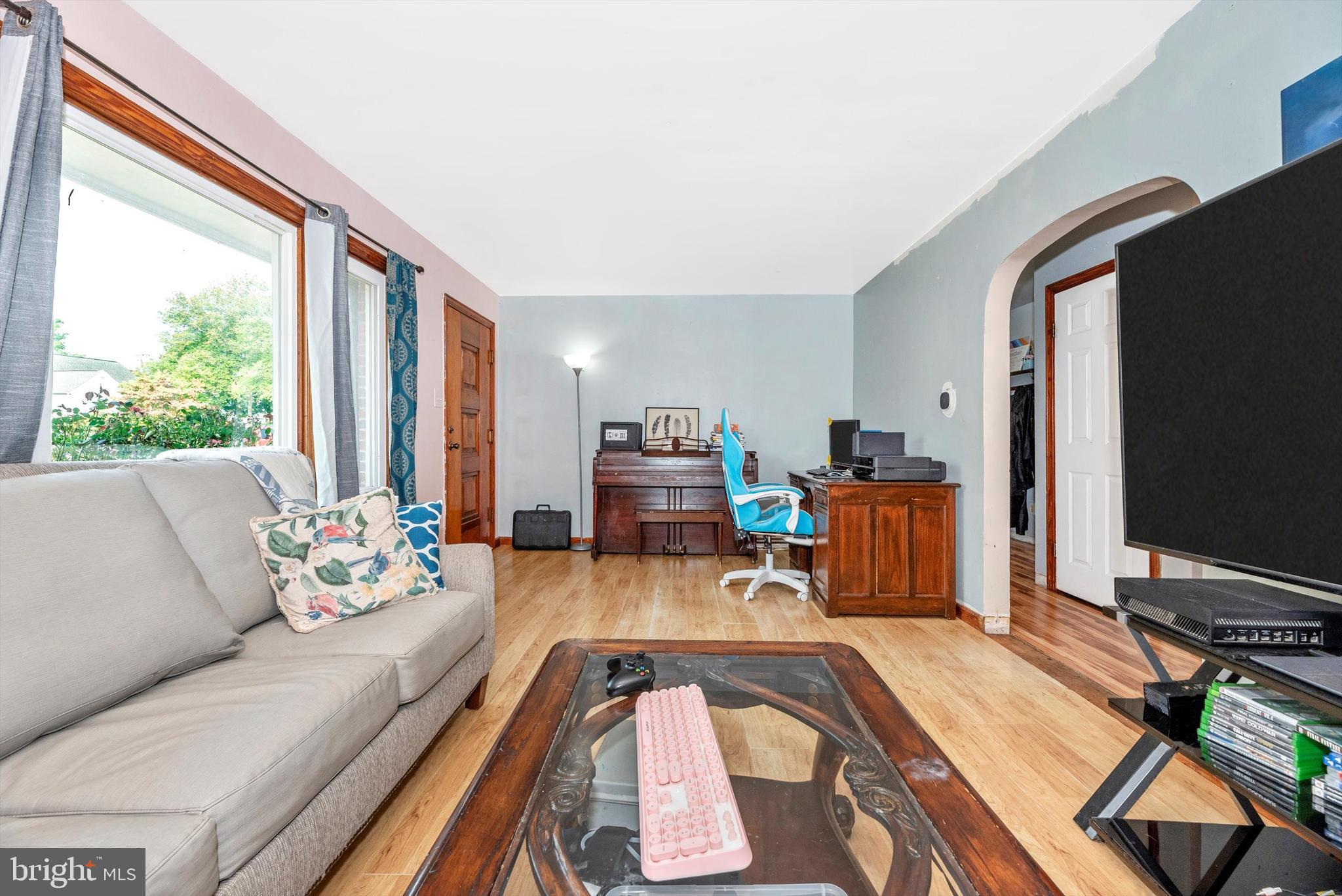 21 Harvard Road Hagerstown, MD 21742 - Photo 2 of 10 a living room with furniture and a flat screen tv