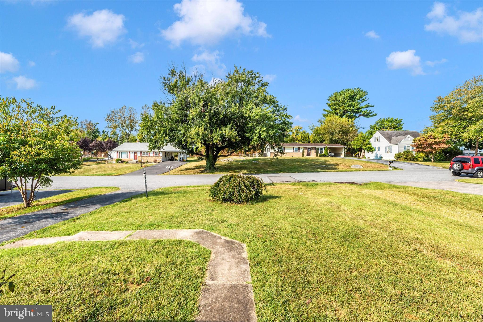 21 Harvard Road Hagerstown, MD 21742 - Photo 10 of 10 a view of a swimming pool with an outdoor space and seating area