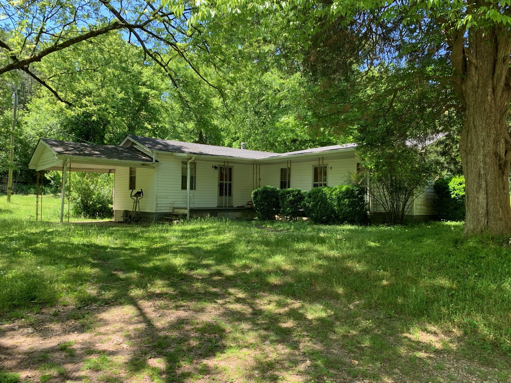 185 Ben Johnson Road Pulaski, TN 38478 - Photo 1 of 23 a view of a house with a backyard