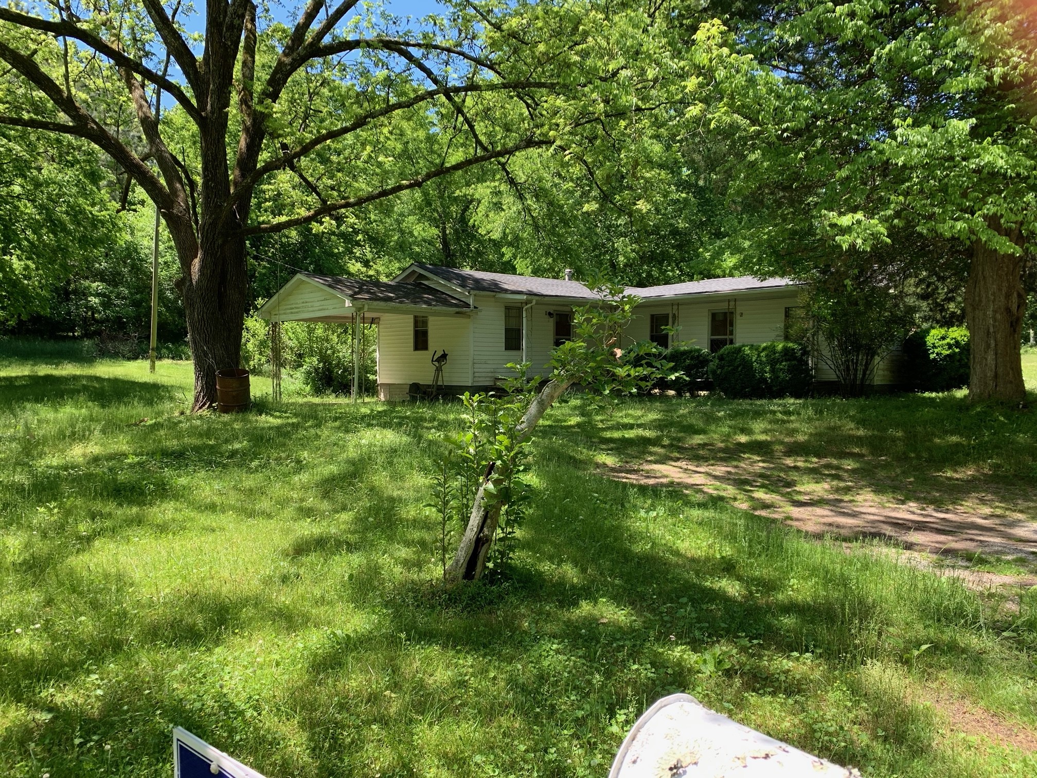 185 Ben Johnson Road Pulaski, TN 38478 - Photo 5 of 23 a backyard of a house with seating space