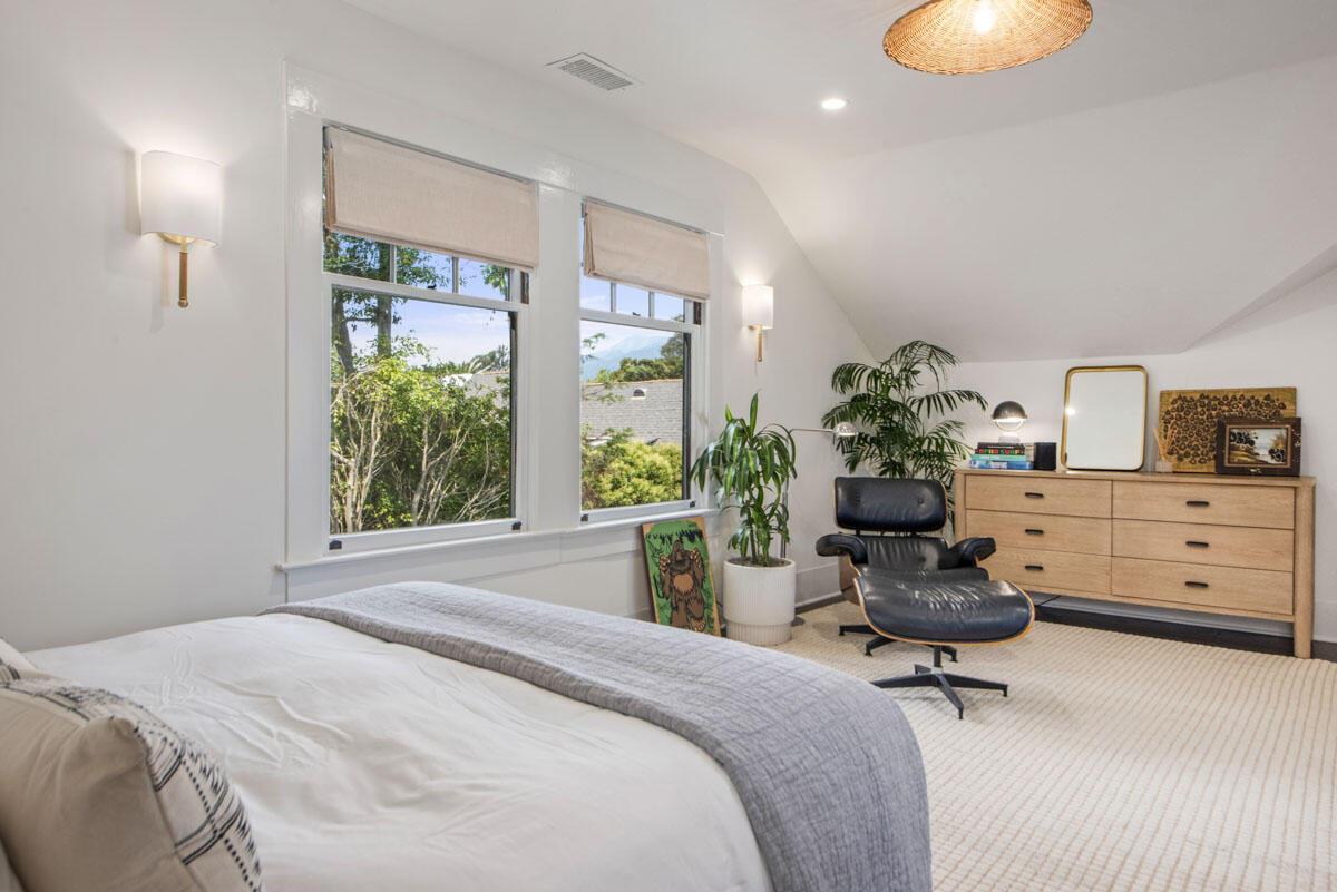 71 Eucalyptus Lane Montecito, CA 93108 - Photo 26 of 69 a bedroom with a bed and a chair