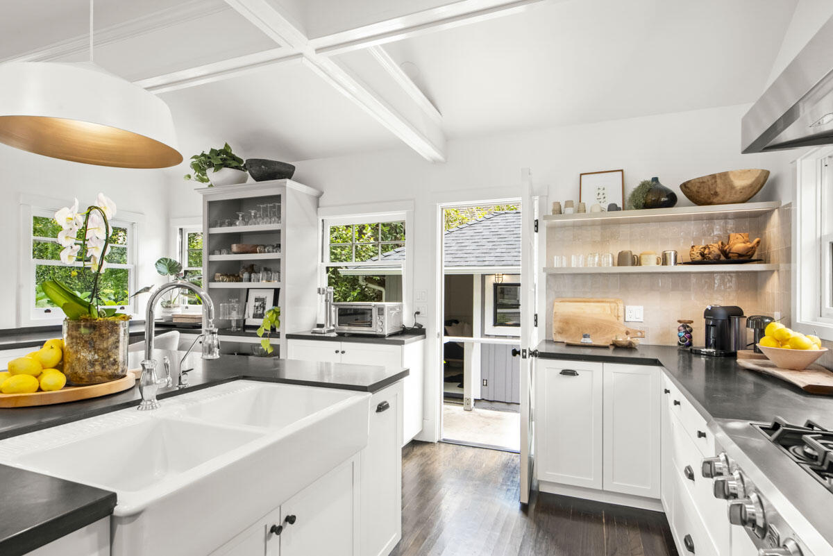 71 Eucalyptus Lane Montecito, CA 93108 - Photo 3 of 69 a kitchen with a sink a stove and cabinets