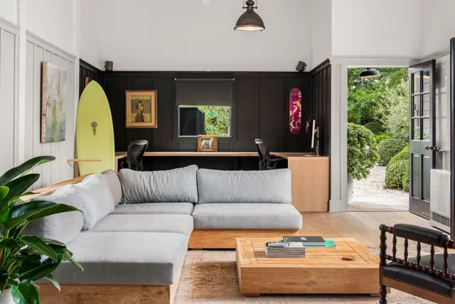 an aerial view of a house with a garden