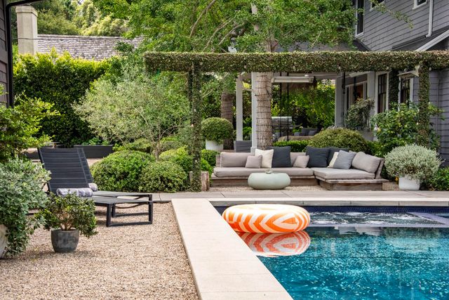 an aerial view of multiple houses with yard