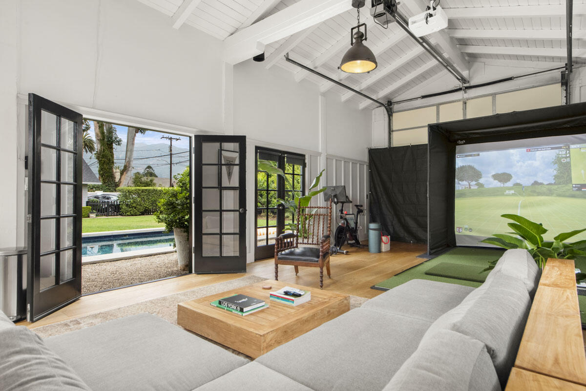 71 Eucalyptus Lane Montecito, CA 93108 - Photo 44 of 69 a living room with patio furniture and a fireplace