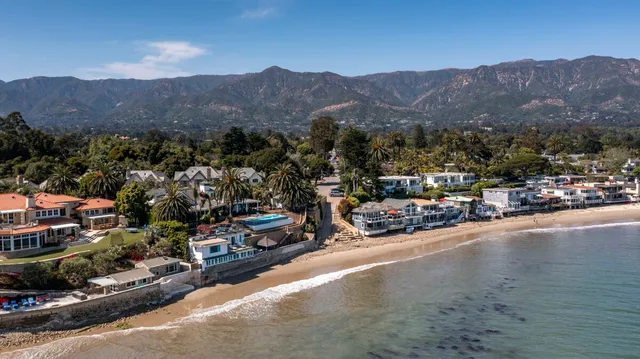 a bedroom with a bed and a furniture