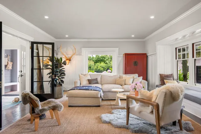 an aerial view of a house with a swimming pool