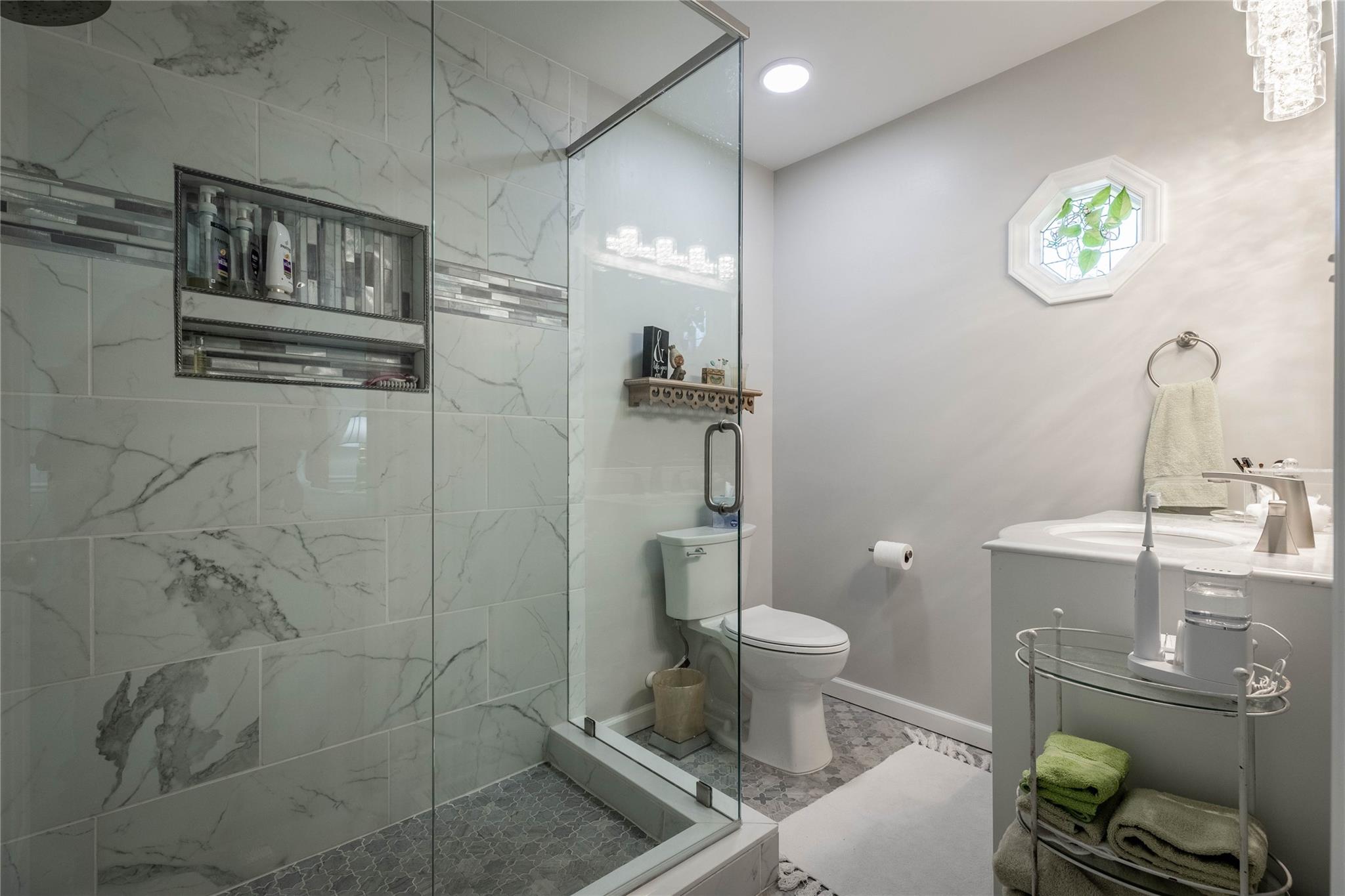 902 Bethel Road Morganton, NC 28655 - Photo 13 of 26 a bathroom with a toilet and a sink