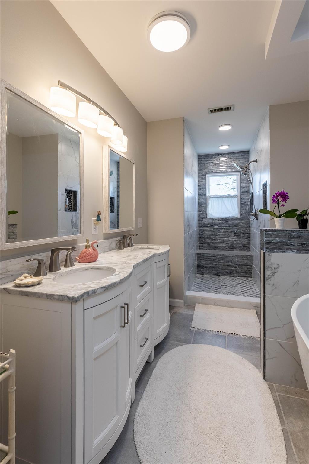 902 Bethel Road Morganton, NC 28655 - Photo 16 of 26 a bathroom with a granite countertop sink mirror and bathtub