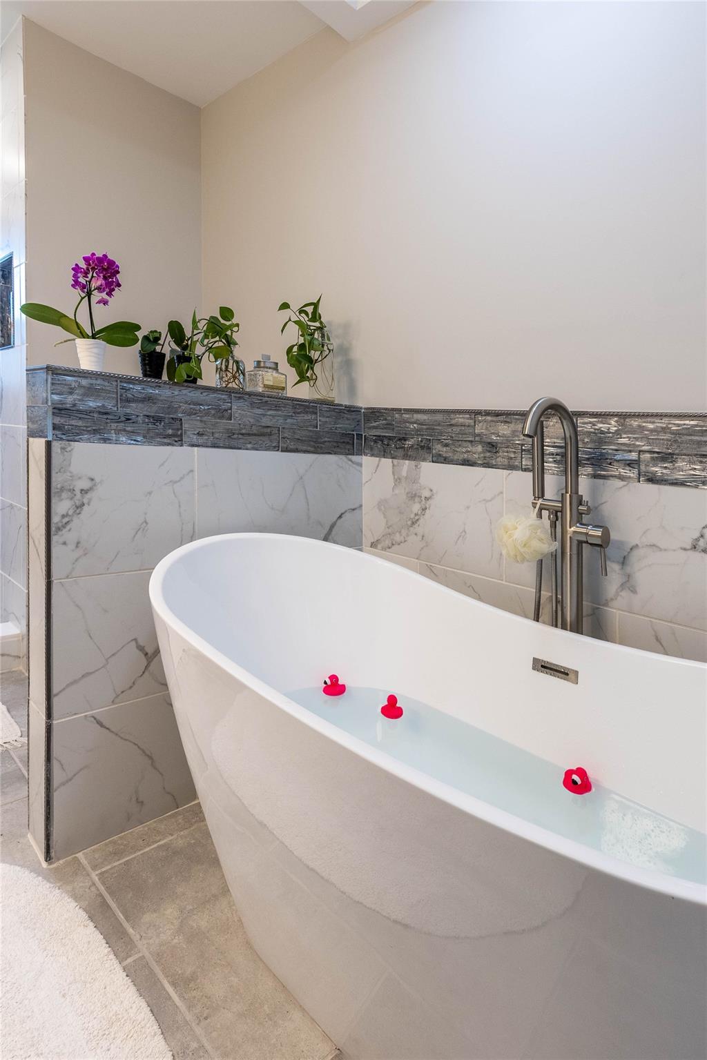 902 Bethel Road Morganton, NC 28655 - Photo 18 of 26 a white bath tub sitting in a bathroom