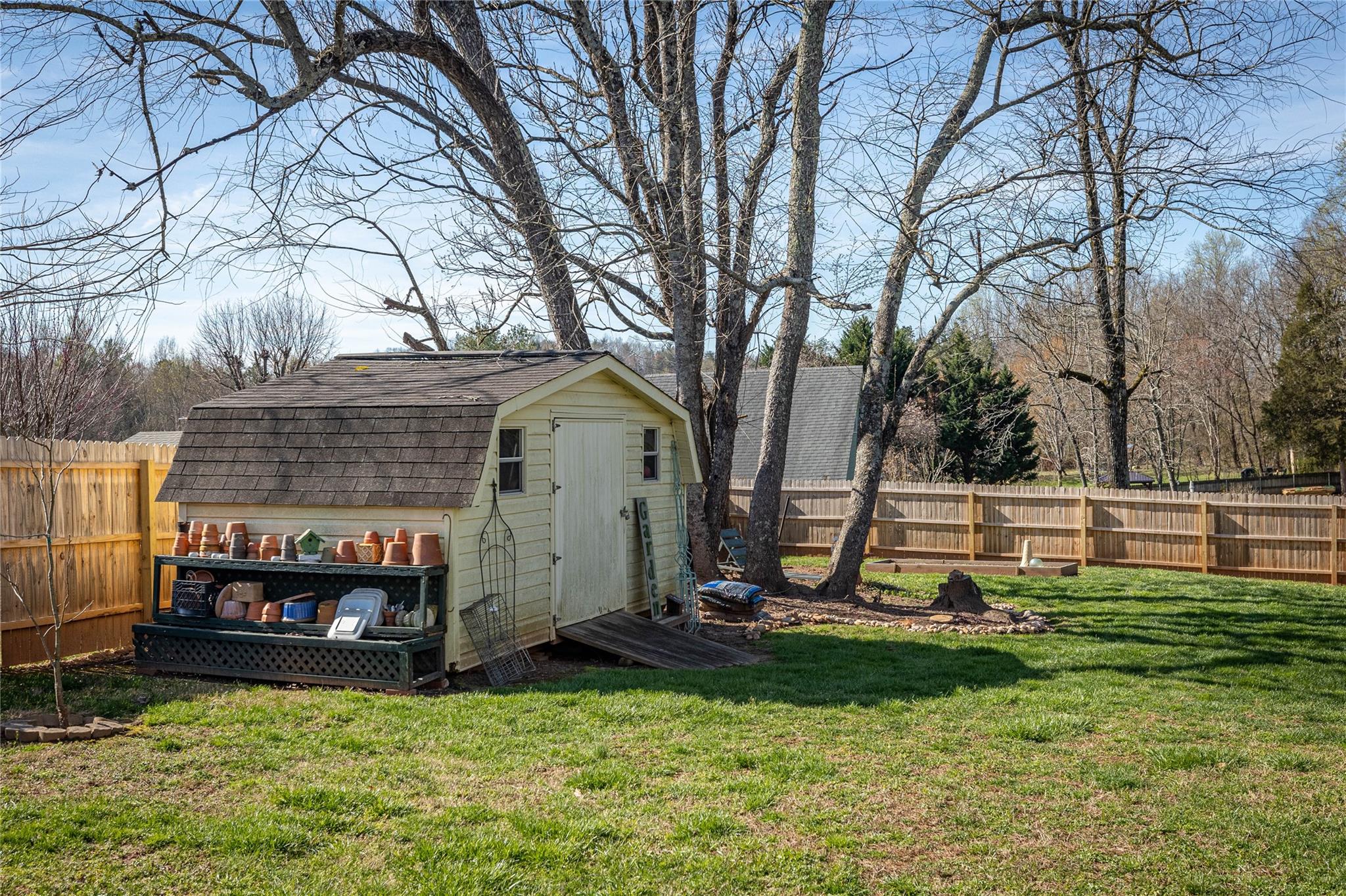 902 Bethel Road Morganton, NC 28655 - Photo 21 of 26 a view of a backyard with a small cabin