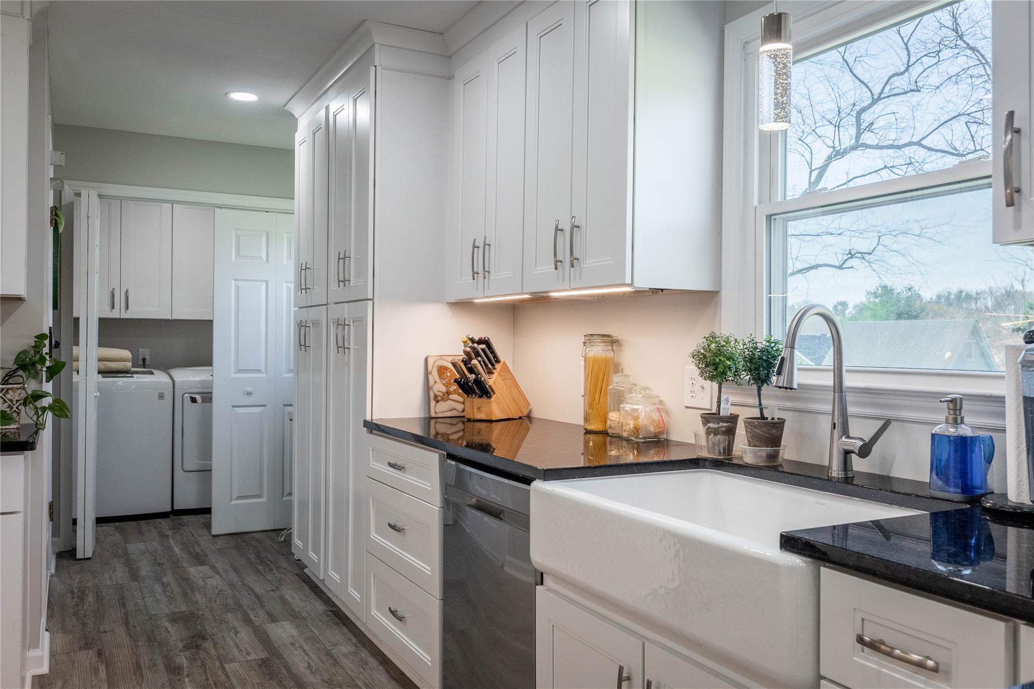 902 Bethel Road Morganton, NC 28655 - Photo 7 of 26 a kitchen with stainless steel appliances granite countertop a sink a stove and cabinets