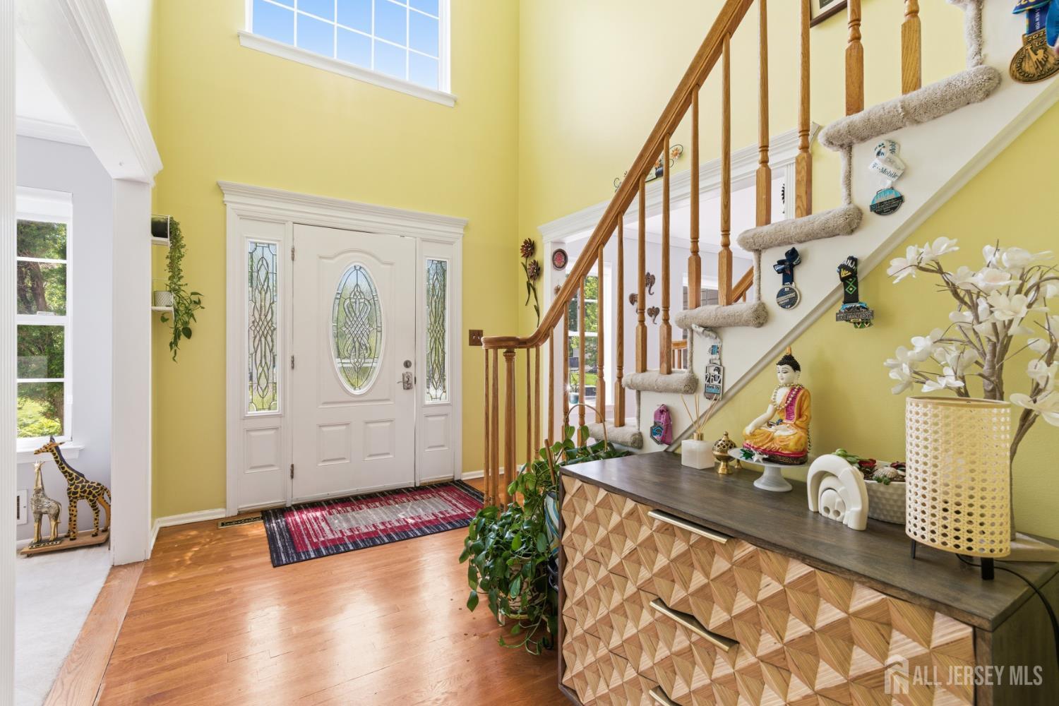 26 Alexis Lane Edison, NJ 08820 - Photo 5 of 39 a view of an entryway with wooden floor
