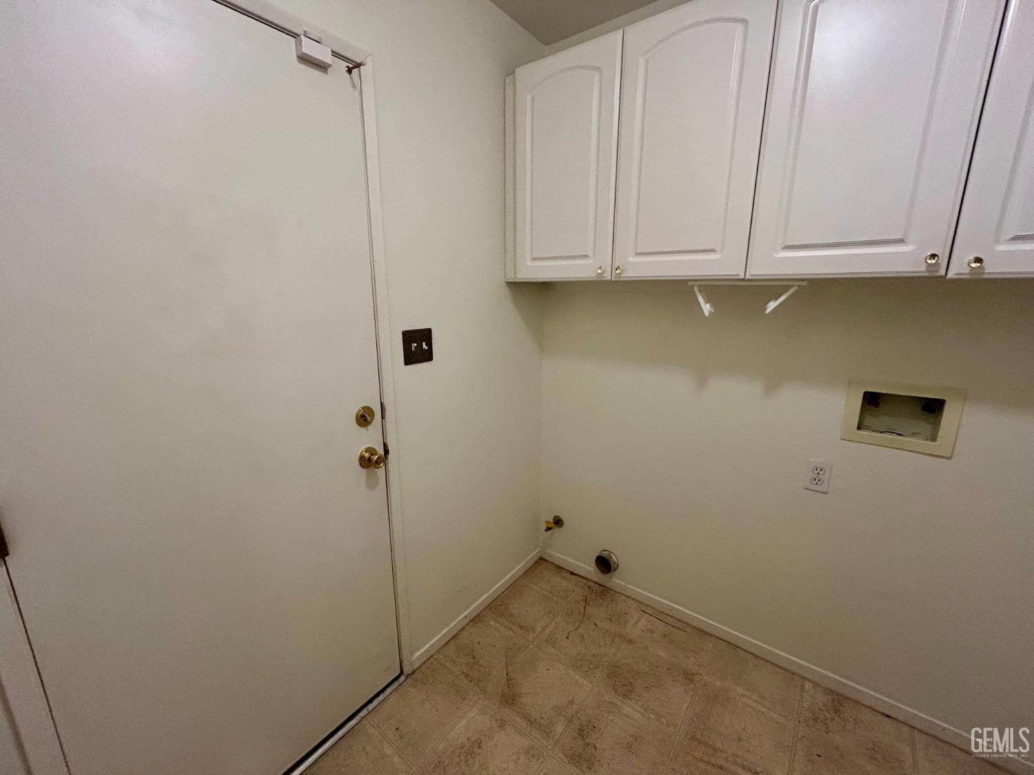 Undisclosed Address Bakersfield, CA 93311 - Photo 14 of 16 a view of cabinets and utility room