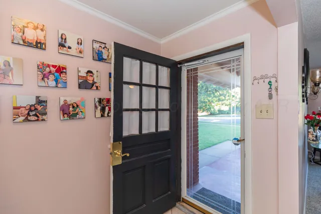 a view of kitchen with wooden floor and outdoor space
