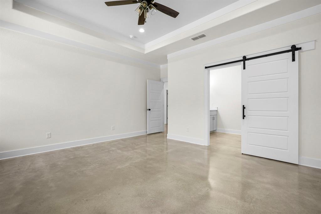 484 Clark Lake Road Weatherford, TX 76088 - Photo 13 of 21 an empty room with closet and a ceiling fan