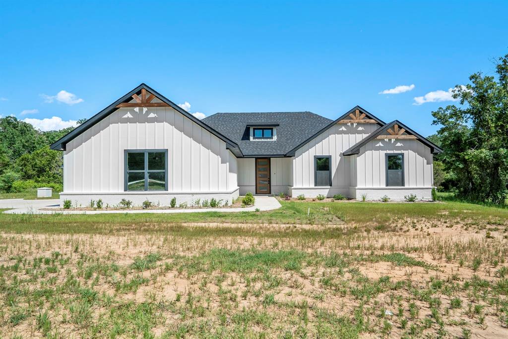 484 Clark Lake Road Weatherford, TX 76088 - Photo 2 of 21 a view of a house with a yard