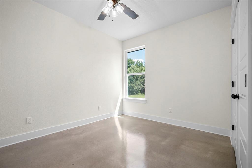 484 Clark Lake Road Weatherford, TX 76088 - Photo 21 of 21 an empty room with a window
