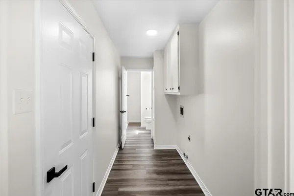 a view of a house with a yard porch and sitting area