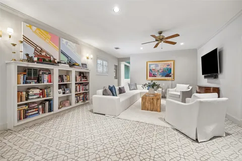 a spacious bathroom with a double vanity sink large mirror and a bathtub